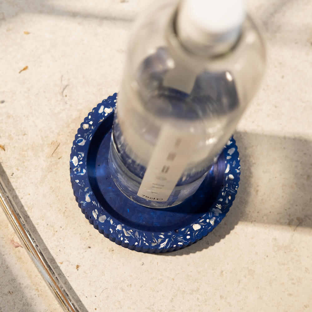 socle bouteille colosse bleu coquillages recycles malakio