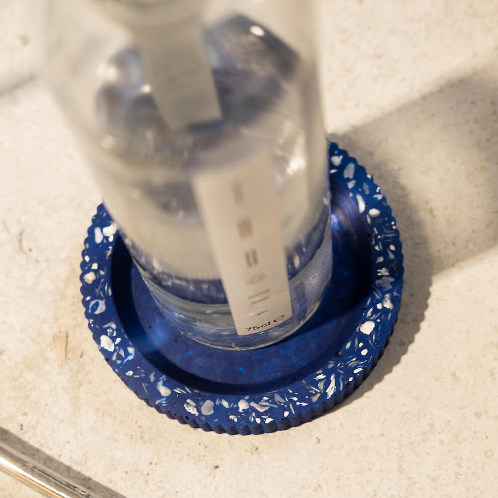 socle bouteille colosse bleu coquillages recycles malakio