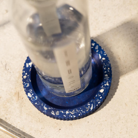 socle bouteille colosse bleu coquillages recycles malakio