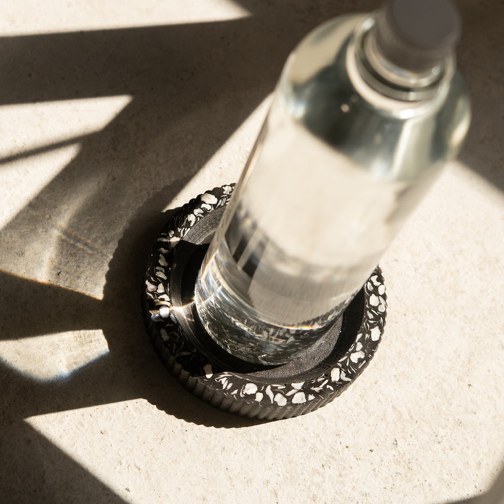 socle de bouteille colosse noir coquillages recycles malakio