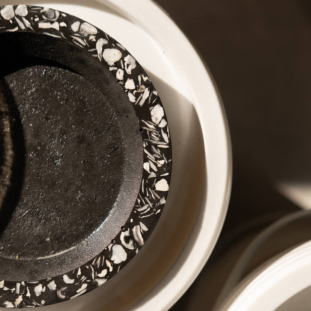 socle de bouteille helios noir coquillages recycles malakio